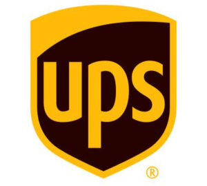 The image is the logo of UPS, a global shipping and logistics company. The logo consists of the lowercase letters "ups" in yellow, displayed on a brown shield with a yellow border.