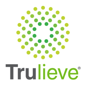The image features the Trulieve logo. The logo consists of a circle made up of several smaller green and yellow dots, forming a circular pattern. Below the circle, the word "Trulieve" is written, with "Tru" in dark gray and "lieve" in green.