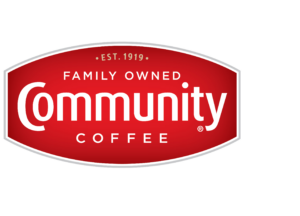 A red oval logo with a silver border displays the text "Community Coffee" in white, bold letters. Above, in smaller white text, it reads "Family Owned" and "Est. 1919.